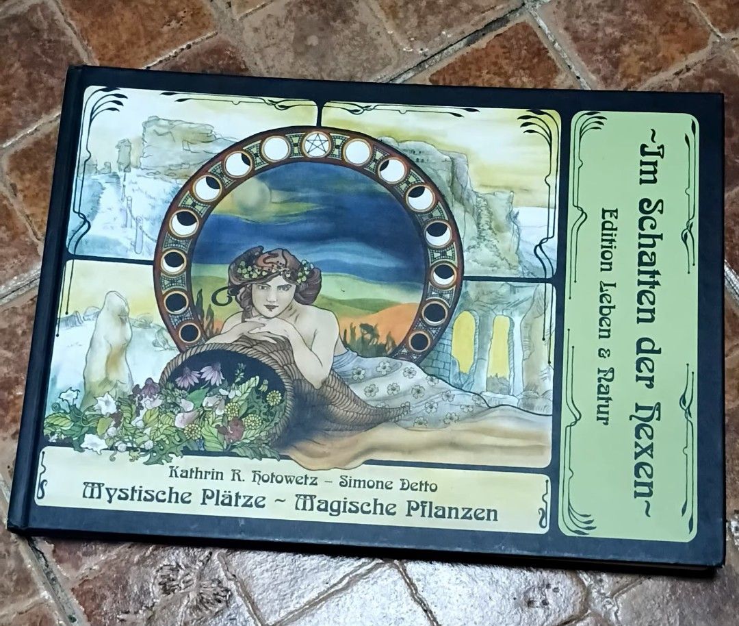 Im Schatten der Hexen Book (Category: Storybooks) located in Quezon City. Submitted by dancatz (Listing ID 1438910325, Image 1). Description: □ P750.00 □ hardbound cover □ German text Book, titled "Im Schatten der Hexen," features artwork and text in German. The cover art includes a woman with flowers and a moon cycle design. The back of the book has additional text and illustrations. LFB Seller location : Brgy. Sta. Teresita, Quezon City Please 