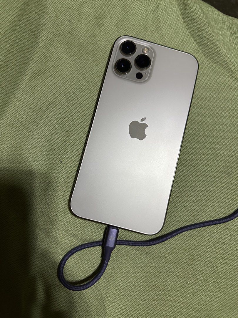 iPhone 12 Pro Max (Category: iPhone 12 Series) located in Meycauayan. Submitted by danzombiex14356 (Listing ID 1439033289, Image 2). Description: Gold 128gb 73% batt Updated to 26.5 Face ID and True Tone working WiFi working Unli reset Malakas Ang speaker All original di pa nabuksan Meet ups QC or Caloocan Negotiable Honest issue. Ghost amoled upper right and center bottom as seen in the picture Circle spot on the picture is just a reflection/ it