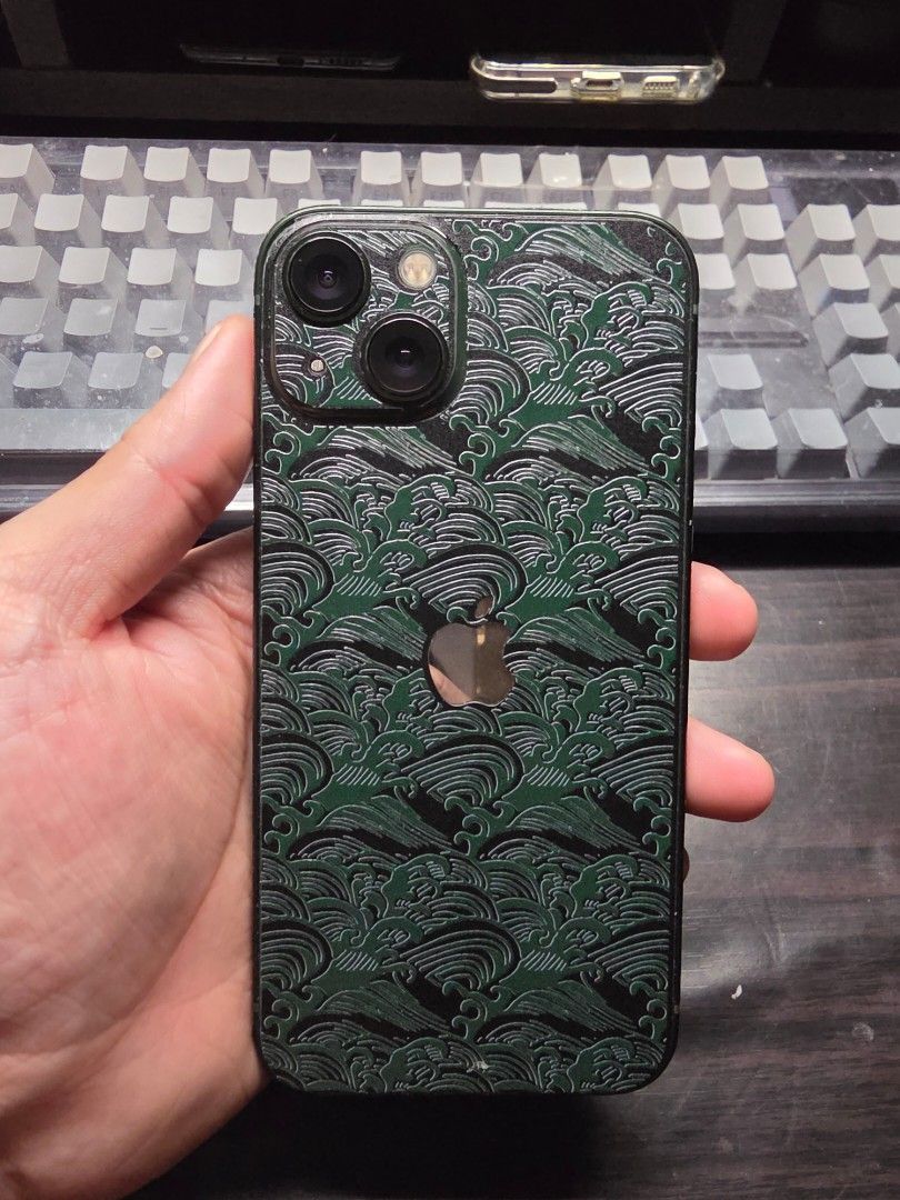 iPhone 13 Green 256GB (Category: Cases & Sleeves) located in Quezon City. Submitted by rmel13 (Listing ID 1439061428, Image 2). Description: - iPhone 13 Green 256GB - 95% smooth I just put a skin to cover 1 or 2 small paint peels -Already updated to ios 26.6 -No icloud issues. Will log out my account and reset upon deal. - Battery health at 71% - Locally purchased at PowerMac -Comes with box same IMEI, original cable and some cases Meetups: North