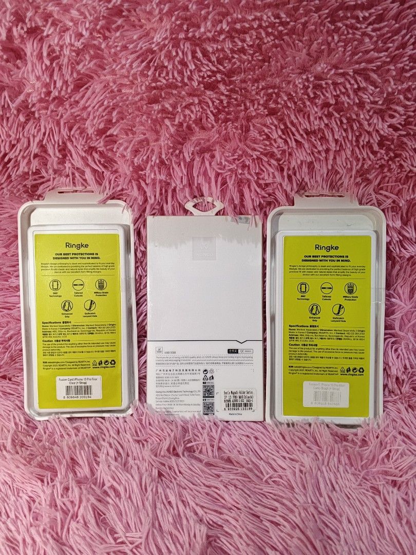Iphone 13 Pro Max Protection Case 3pcs (Category: Cases & Sleeves) located in Quezon City. Submitted by jtlaconsumergoodstrading (Listing ID 1438978356, Image 2). Description: Iphone 13 Pro Max Protection Case 3pcs brand new Case brand: 1:Ringke Fusion Card case with a paracord strap for an iPhone 13 Pro Max, Black color. 2: Ringke Fusion X case for the iPhone 13 Pro Max featuring a black bumper and a clear back panel. 3: Xundd brand clear protec