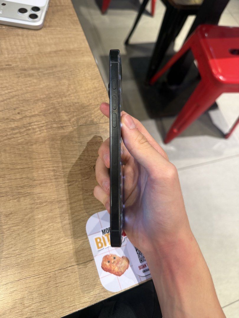 iPhone 16 Pro Max Black Titanium 256GB (Category: iPhone 16 Series) located in Singapore. Submitted by coolgadgets66 (Listing ID 1436070900, Image 3). Description: All functions working no dents or scratches.