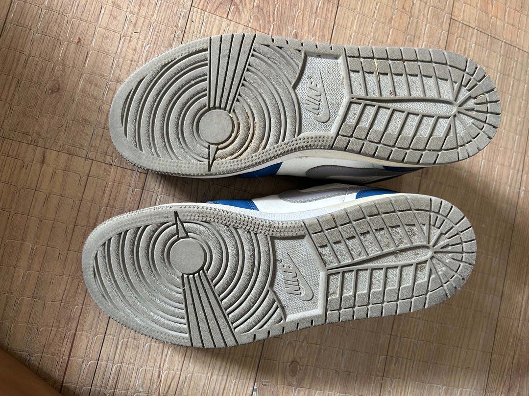 Jordan Air Low Top Sneakers (Category: Sneakers) located in Cavite. Submitted by rwyanewade39874 (Listing ID 1438945773, Image 3). Description: - Jordan Air low top sneakers - Color: Blue and white - Size: 5Y EUR37.5 - Interior: Grey - Condition: Good - Sole wear present - Blue laces - Iconic Jordan logo on tongue.