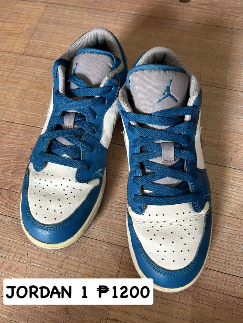 Jordan Air Low Top Sneakers (Category: Sneakers) located in Cavite. Submitted by rwyanewade39874 (Listing ID 1438945773, Image 1). Description: - Jordan Air low top sneakers - Color: Blue and white - Size: 5Y EUR37.5 - Interior: Grey - Condition: Good - Sole wear present - Blue laces - Iconic Jordan logo on tongue.