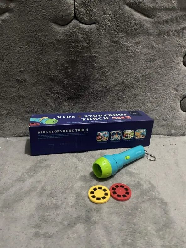 Kids Storybook Torch Set (Category: Children's Books) located in Valenzuela. Submitted by feur.u (Listing ID 1439033096, Image 1). Description: - Kids Storybook Torch Set - Includes a blue and green torch - Comes with two storybook discs - Projects storybook scenes - Perfect for bedtime stories and imaginative play.