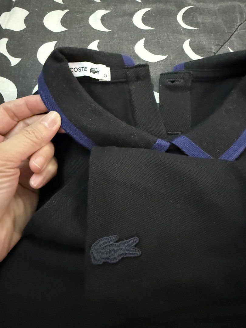 Lacoste black polo shirt (Category: Shirts) located in Malabon City. Submitted by splendidcloset (Listing ID 1438892119, Image 3). Description: .