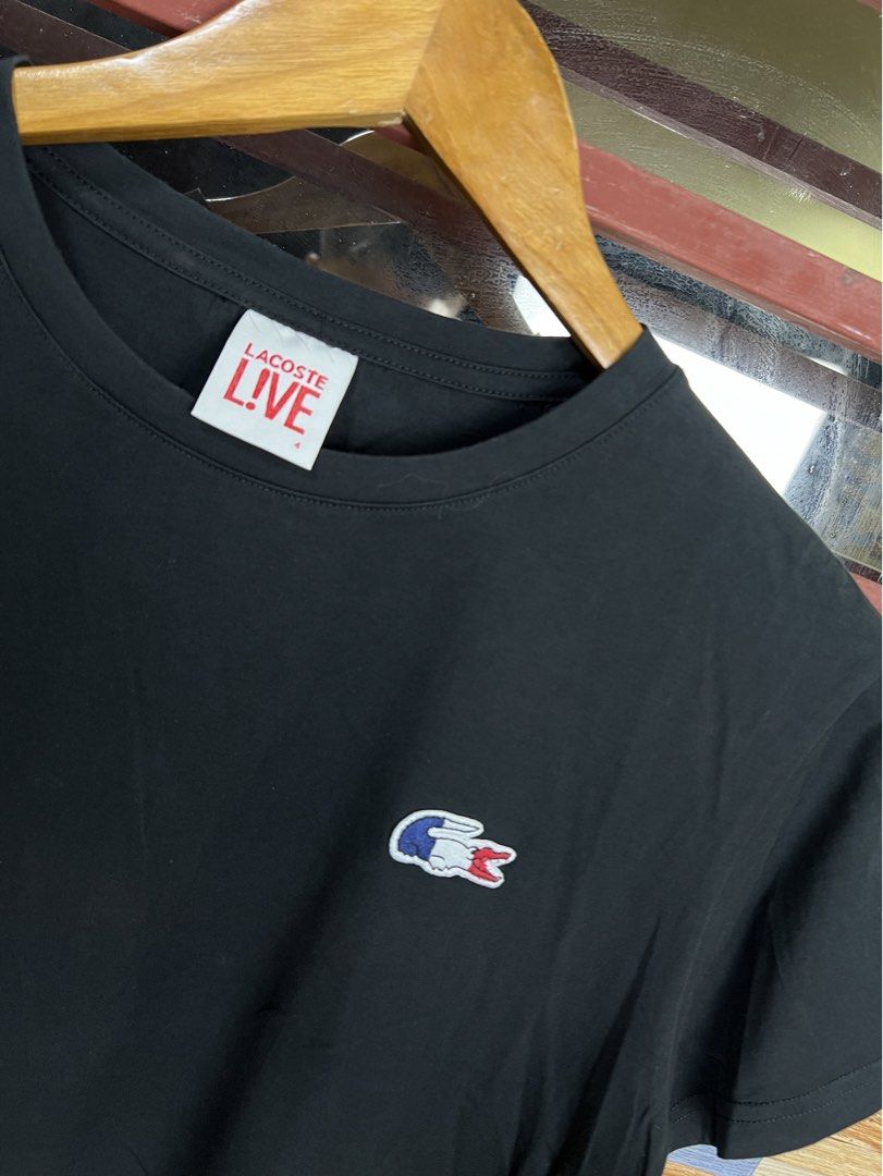 Lacoste Live Black T-shirt (Category: Tshirts & Polo Shirts ) located in Iba. Submitted by saploot (Listing ID 1439034222, Image 2). Description: - Black Lacoste Live T-shirt - Features the Lacoste Live logo on the chest - Made in China - size: 4 - 20x26.