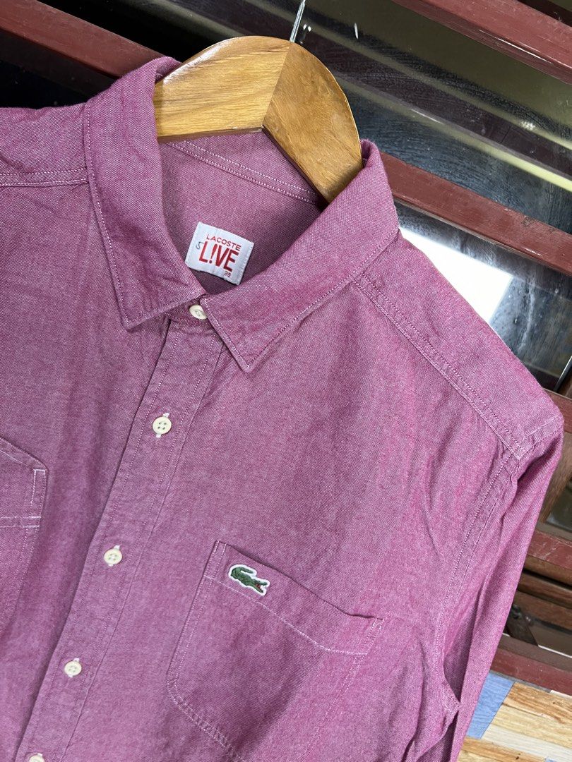 Lacoste Live Long Sleeve Shirt (Category: Tshirts & Polo Shirts ) located in Iba. Submitted by saploot (Listing ID 1439034681, Image 2). Description: - Lacoste Live long-sleeved shirt - 19x28 - Eye-catching red color - Button-down style - Two chest pockets - Classic collar - Buttoned cuffs - Features the Lacoste logo - Textured fabric.