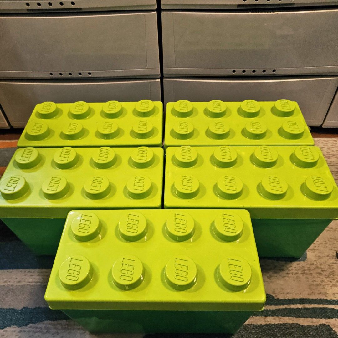 LEGO Storage Brick Box - Green (Category: Storage Boxes & Baskets) located in Quezon City. Submitted by northernlegends (Listing ID 1438903936, Image 2). Description: - LEGO-style storage boxes - Green boxes with yellow LEGO brick lids - Features the LEGO logo - Stackable design - Curved interior - Ideal for toy storage and other items.