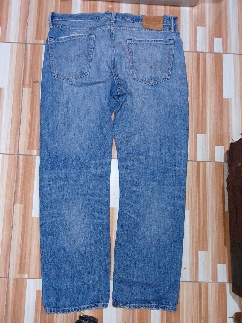 Levi's 504 Jeans (Category: Jeans) located in Caloocan City. Submitted by keenphoenix.63e799 (Listing ID 1438916111, Image 2). Description: - Levi's 501 jeans - Light blue wash - Straight leg fit - Button fly - Features the iconic Levi's red tab - Shows wear on front pockets - Classic and versatile.