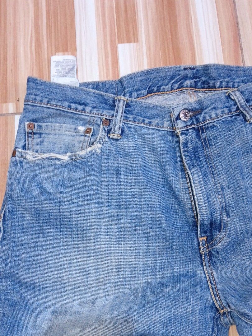 Levi's 504 Jeans (Category: Jeans) located in Caloocan City. Submitted by keenphoenix.63e799 (Listing ID 1438916111, Image 3). Description: - Levi's 501 jeans - Light blue wash - Straight leg fit - Button fly - Features the iconic Levi's red tab - Shows wear on front pockets - Classic and versatile.
