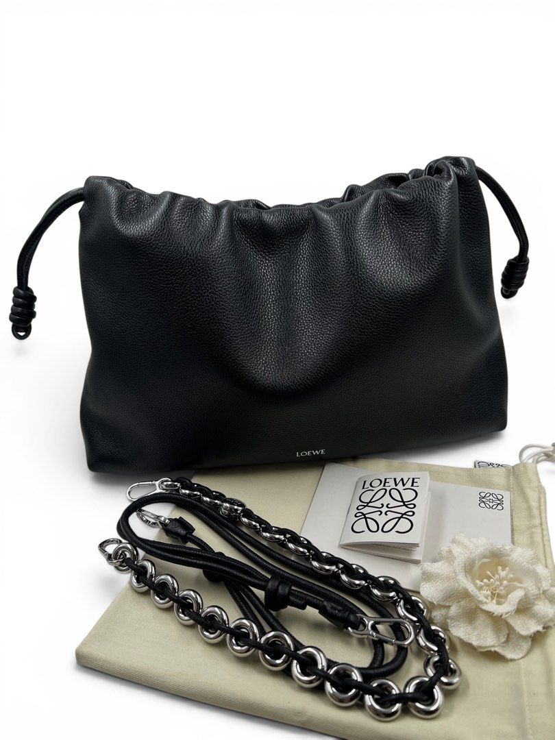⚜️Loewe Flamenco large bag (Category: Luxury Bags & Wallets) located in Makati City. Submitted by 90sangel (Listing ID 1439061630, Image 2). Description: •Item: Loewe Flamenco clutch bag in black grained calfskin 🤍 •Size: Large 🍂 •Condition: Excellent! *Very soft and slouchy bag with a cinched closure and knot drawstrings. 🍂🤍 Can wear Shoulder, crossbody or hand carry Detachable and adjustable strap. Includes dustbag + big loewe paperbag.