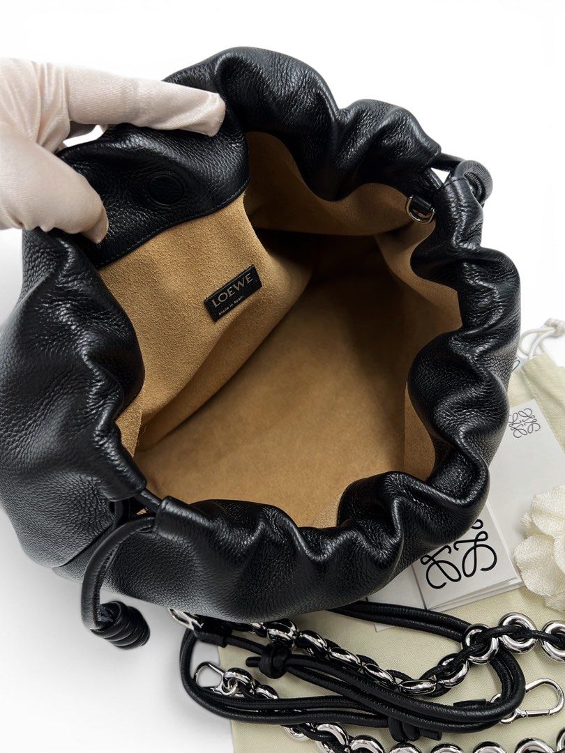 ⚜️Loewe Flamenco large bag (Category: Luxury Bags & Wallets) located in Makati City. Submitted by 90sangel (Listing ID 1439061630, Image 3). Description: •Item: Loewe Flamenco clutch bag in black grained calfskin 🤍 •Size: Large 🍂 •Condition: Excellent! *Very soft and slouchy bag with a cinched closure and knot drawstrings. 🍂🤍 Can wear Shoulder, crossbody or hand carry Detachable and adjustable strap. Includes dustbag + big loewe paperbag.