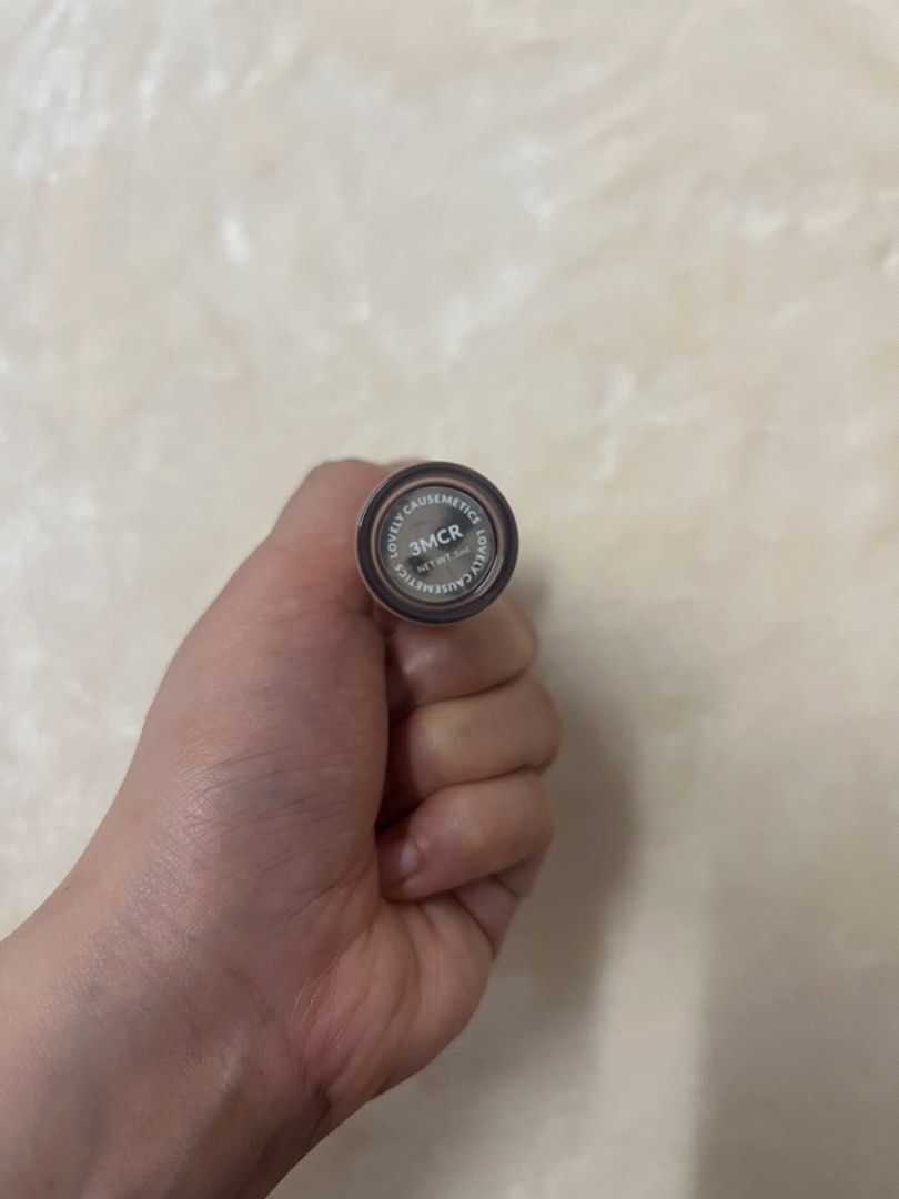 Lovely Cosmetics Concealer in 3MCR (Category: Makeup) located in Cagayan de Oro. Submitted by simplydecluttering_makeup (Listing ID 1438992684, Image 2). Description: Can be used as spot concealer or corrector. Rfs: Not a shade I need. I use 3MC. - Lovely Cosmetics Concealer - Shade: 3MCR - Light beige color - Designed to conceal imperfections and blemishes - Clear tube with a silver cap - Visible applicator Used once at the back of my hand to sw