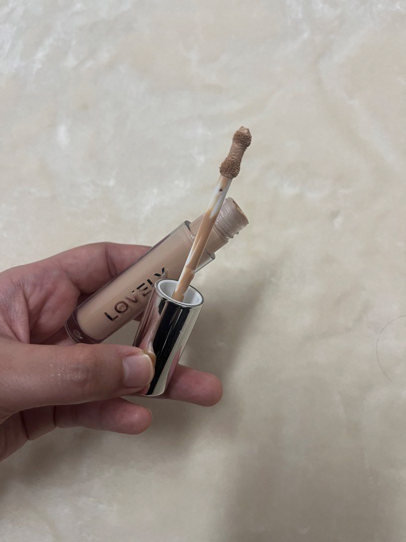 Lovely Cosmetics Concealer in 3MCR (Category: Makeup) located in Cagayan de Oro. Submitted by simplydecluttering_makeup (Listing ID 1438992684, Image 3). Description: Can be used as spot concealer or corrector. Rfs: Not a shade I need. I use 3MC. - Lovely Cosmetics Concealer - Shade: 3MCR - Light beige color - Designed to conceal imperfections and blemishes - Clear tube with a silver cap - Visible applicator Used once at the back of my hand to sw
