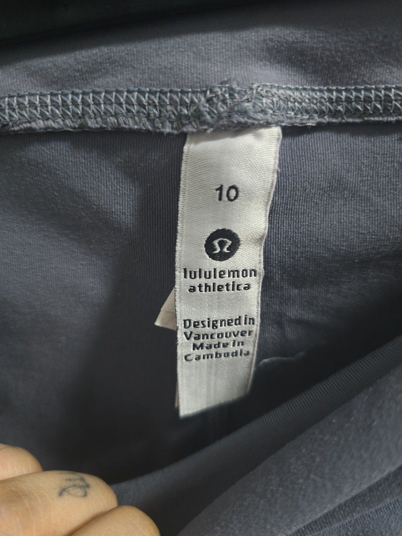 Lululemon Athletica Shorts Size 10 (Category: Shorts) located in Pasig City. Submitted by callmemaf (Listing ID 1438918471, Image 3). Description: - Lululemon Athletica shorts - Size 10 - Gray color - High-waisted - Fitted design - Visible stitching details - Designed in Vancouver, Made in Cambodia.