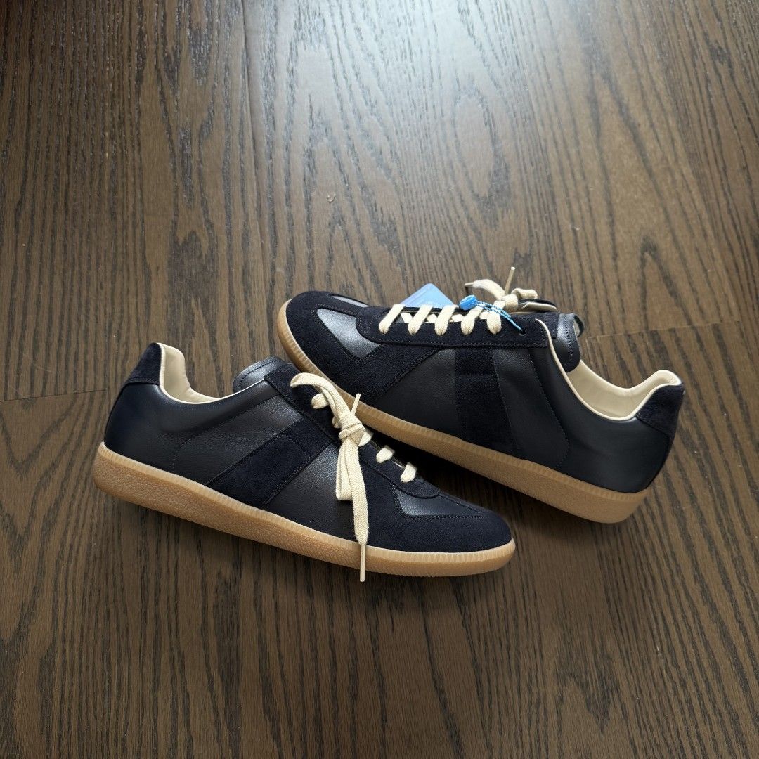 Maison Margiela gats(Dark navy blue) (Category: Sneakers & Footwear) located in Makati City. Submitted by donda.archives (Listing ID 1438927270, Image 1). Description: Size 40-47. Batch with fully built-in NFC chip. Imported INCAS leather used. The leather has a nice matte finish, and the overall shoe shape is solid with no issues. The overall leather color is consistent. Everything follows the same standards: the entire shoe is genuine leather, 