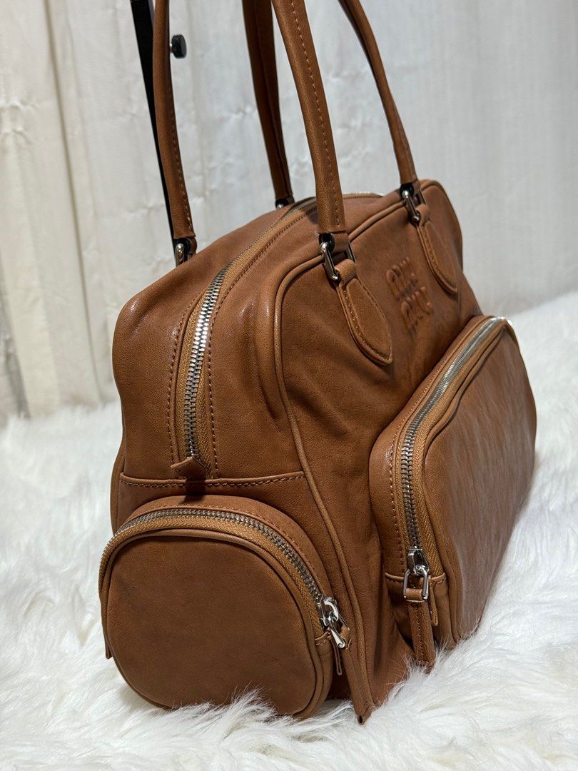 Miu miu Nappa Leather Top-Handle Bag (Category: Luxury Bags & Wallets) located in Manila. Submitted by shoulderfashion (Listing ID 1439006097, Image 3). Description: .