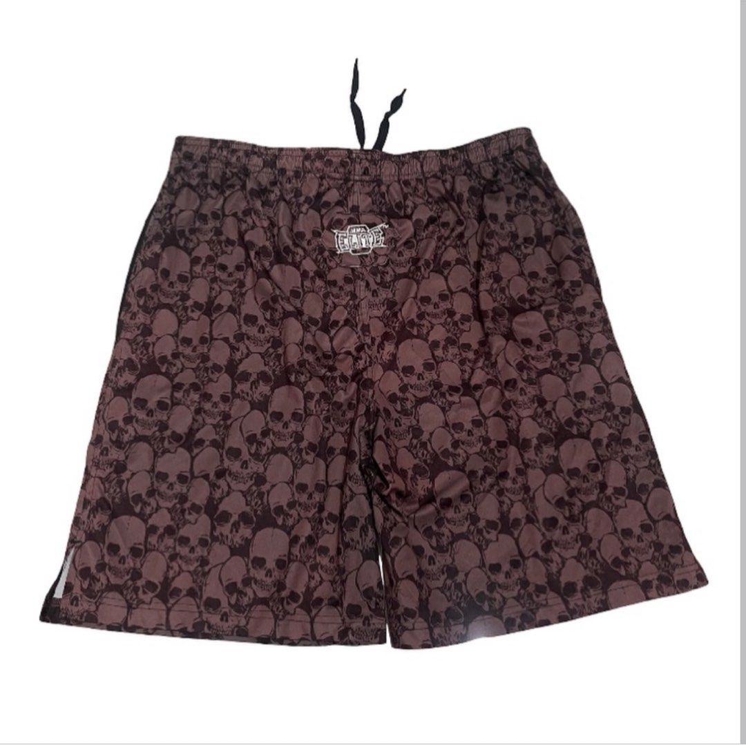 MMA Elite Skull Print Shorts (Category: Shorts) located in Cebu City. Submitted by hellyeah.finds (Listing ID 1439054094, Image 2). Description: - MMA Elite shorts - All-over skull print - Drawstring waistband - Adjustable W34 L22 Logo patch on leg - Lightweight material - Suitable for training or casual wear - Black drawstring - Black side stripe.