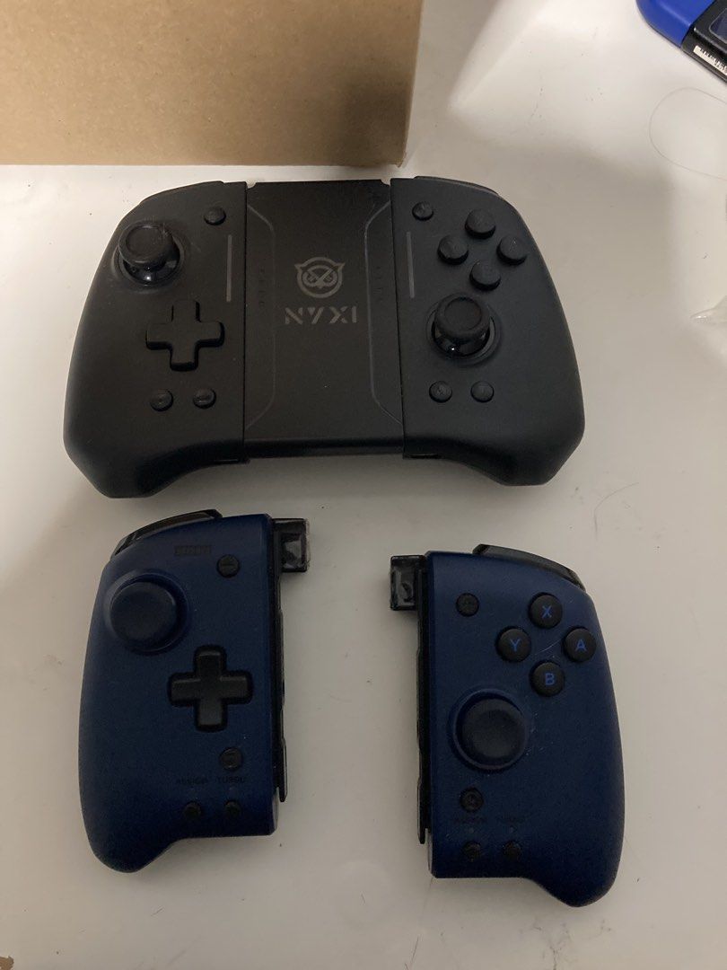 Moddable nintendo switch (Read Description) (Category: Nintendo) located in Singapore. Submitted by dudegt (Listing ID 1439029110, Image 3). Description: Moddable Nintendo switchs Switch with grey joycon is softmod only using rcmloader exploit (not exploited yet) Switch with purple joycon is hardmod with picofly chip inside but has sd card connector spoilt (you have to sent to repair to use the sd card slot for storage and custom firmware mods). 