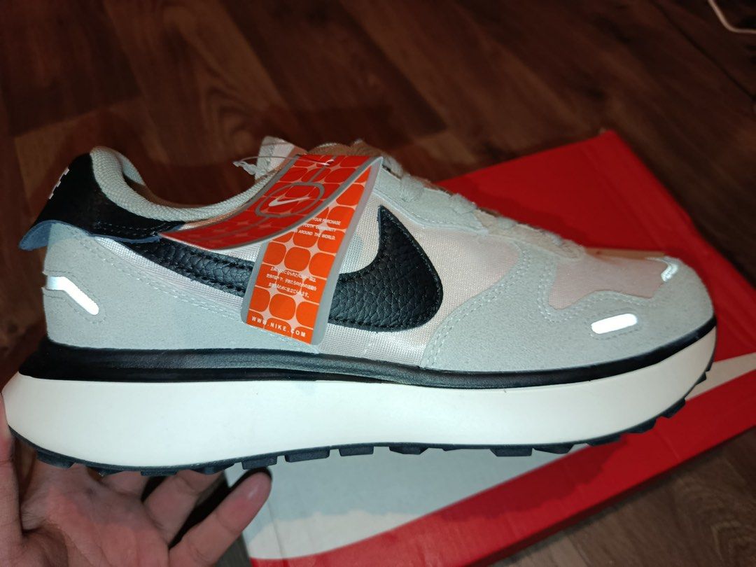 Nike Phoenix Waffle Grey/Pink Sneakers (Category: Sneakers) located in Bacolod City. Submitted by swagspot (Listing ID 1438963424, Image 3). Description: - Nike Phoenix Waffle sneakers - Color: Grey and pink - Nike swoosh: Black - Sole: White - Size: UK 9 / BR 42 / EUR 44 / US 10 - Includes original box - Reflective details on sides and heel.
