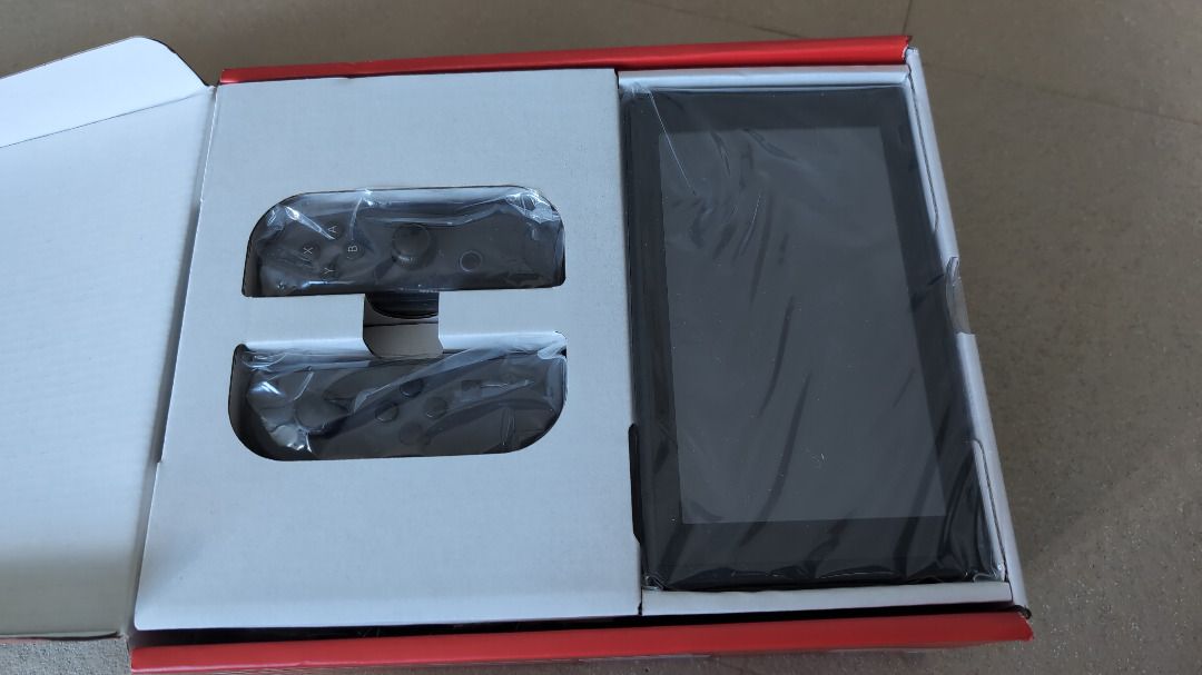 Nintendo Switch Console (Category: Nintendo) located in Baliuag. Submitted by silverowl_276a42 (Listing ID 1438974072, Image 2). Description: - Only used docked for Ringfit - Nintendo Switch console included - Comes with Joy-Con controllers - Includes: - Console - Dock - Joy-Con grip - AC adapter - Joy-Con straps - Also includes a Dust-Proof Kit - Controller grip included - All items are in original packaging.