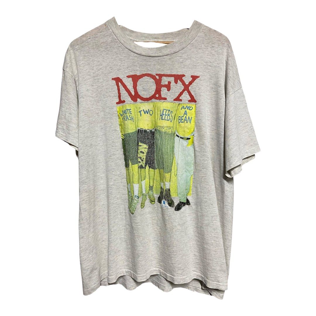 NOFX T-Shirt - 1993 Epitaph (Category: Tshirts & Polo Shirts ) located in Binan City. Submitted by doze16 (Listing ID 1439038712, Image 1). Description: - Vintage NOFX t-shirt - Features album art from "White Trash, Two Heebs and a Bean" - Gray crew neck - Fat Wreck Chords logo on the back - Epitaph label, dated 1993.