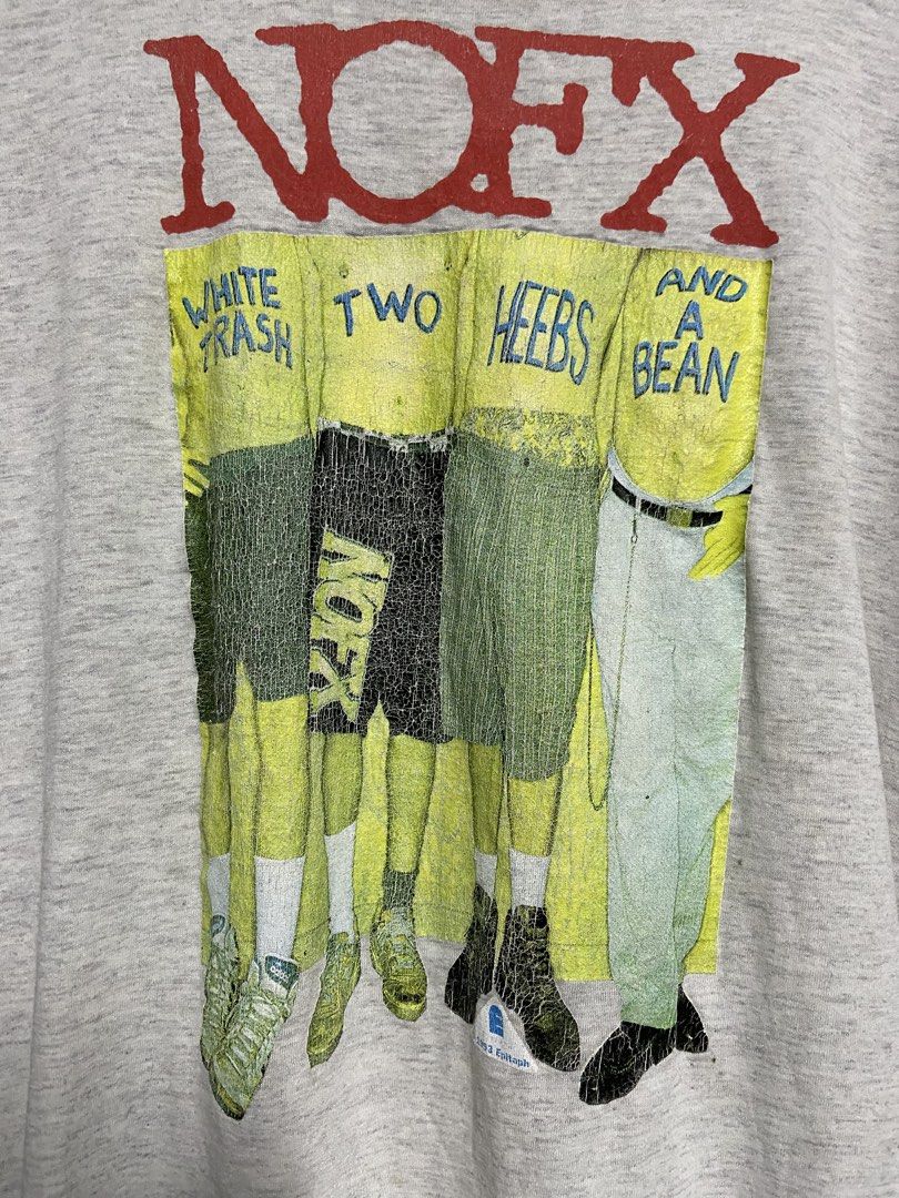 NOFX T-Shirt - 1993 Epitaph (Category: Tshirts & Polo Shirts ) located in Binan City. Submitted by doze16 (Listing ID 1439038712, Image 2). Description: - Vintage NOFX t-shirt - Features album art from "White Trash, Two Heebs and a Bean" - Gray crew neck - Fat Wreck Chords logo on the back - Epitaph label, dated 1993.
