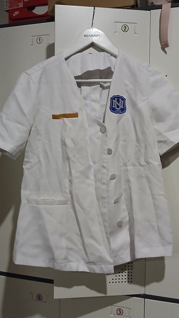 NU BS PSYCH UNIFORM (FEMALE) (Category: Coats, Jackets and Outerwear) located in Cainta. Submitted by anlogabor (Listing ID 1438881699, Image 1). Description: obvious signs of use, slight yellow stain on the underarm area lab gown still in like new condition.