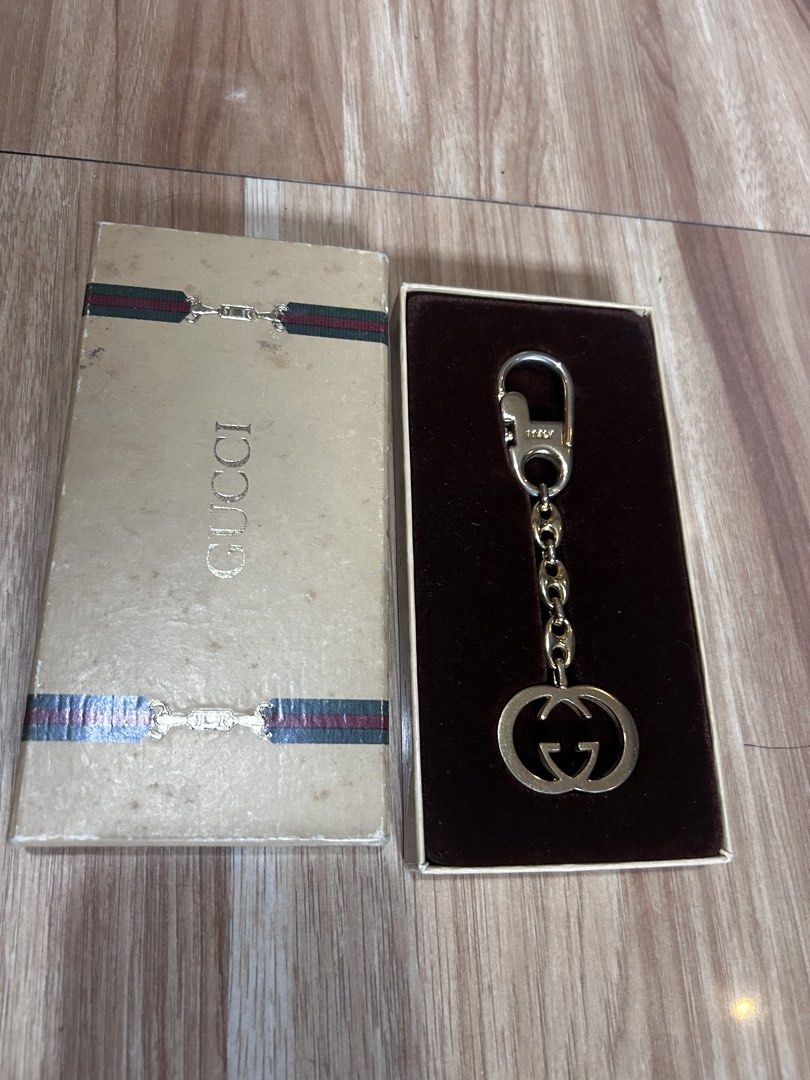ORIGINAL GUCCI KEYCHAIN/BAG CHAIN (Category: Luxury Apparel) located in Makati City. Submitted by collexziones (Listing ID 1438908947, Image 1). Description: A GIFT NOT USED NAITAGO LANG THUS THE BOX CONDITION IS STAINED DUES TO STORAGE .