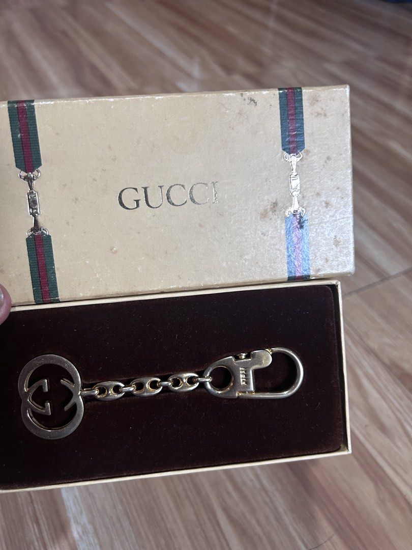 ORIGINAL GUCCI KEYCHAIN/BAG CHAIN (Category: Luxury Apparel) located in Makati City. Submitted by collexziones (Listing ID 1438908947, Image 3). Description: A GIFT NOT USED NAITAGO LANG THUS THE BOX CONDITION IS STAINED DUES TO STORAGE .