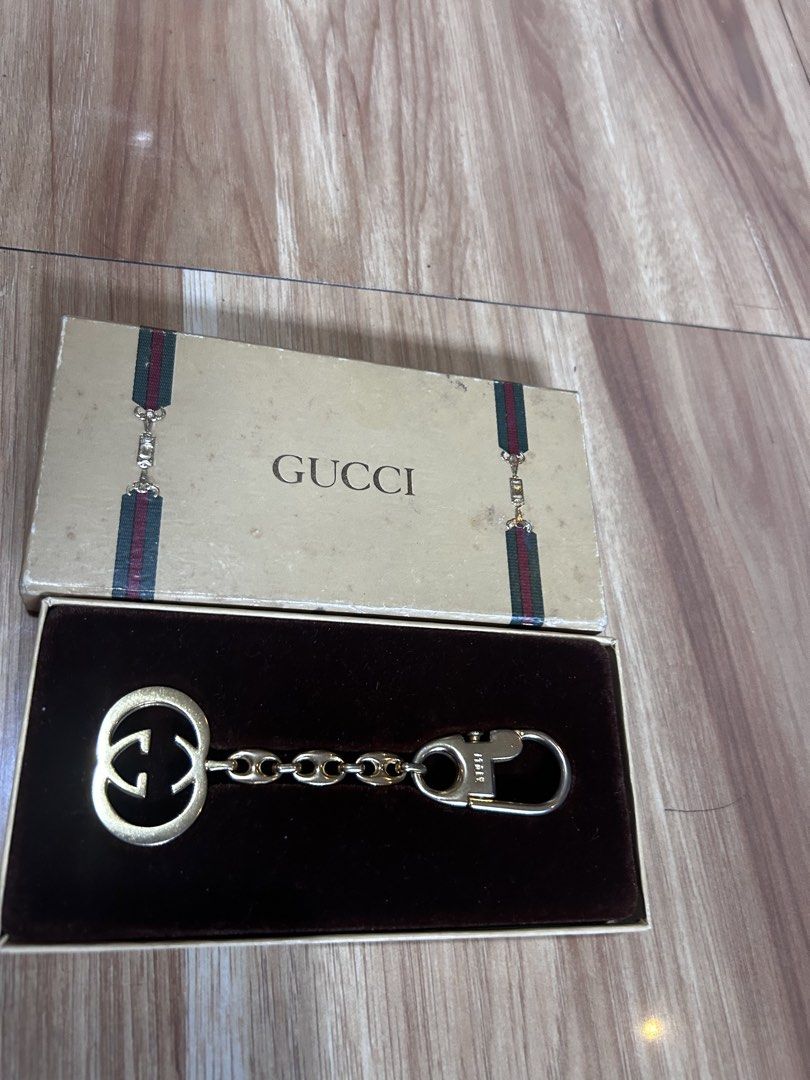 ORIGINAL GUCCI KEYCHAIN/BAG CHAIN (Category: Luxury Apparel) located in Makati City. Submitted by collexziones (Listing ID 1438908947, Image 2). Description: A GIFT NOT USED NAITAGO LANG THUS THE BOX CONDITION IS STAINED DUES TO STORAGE .