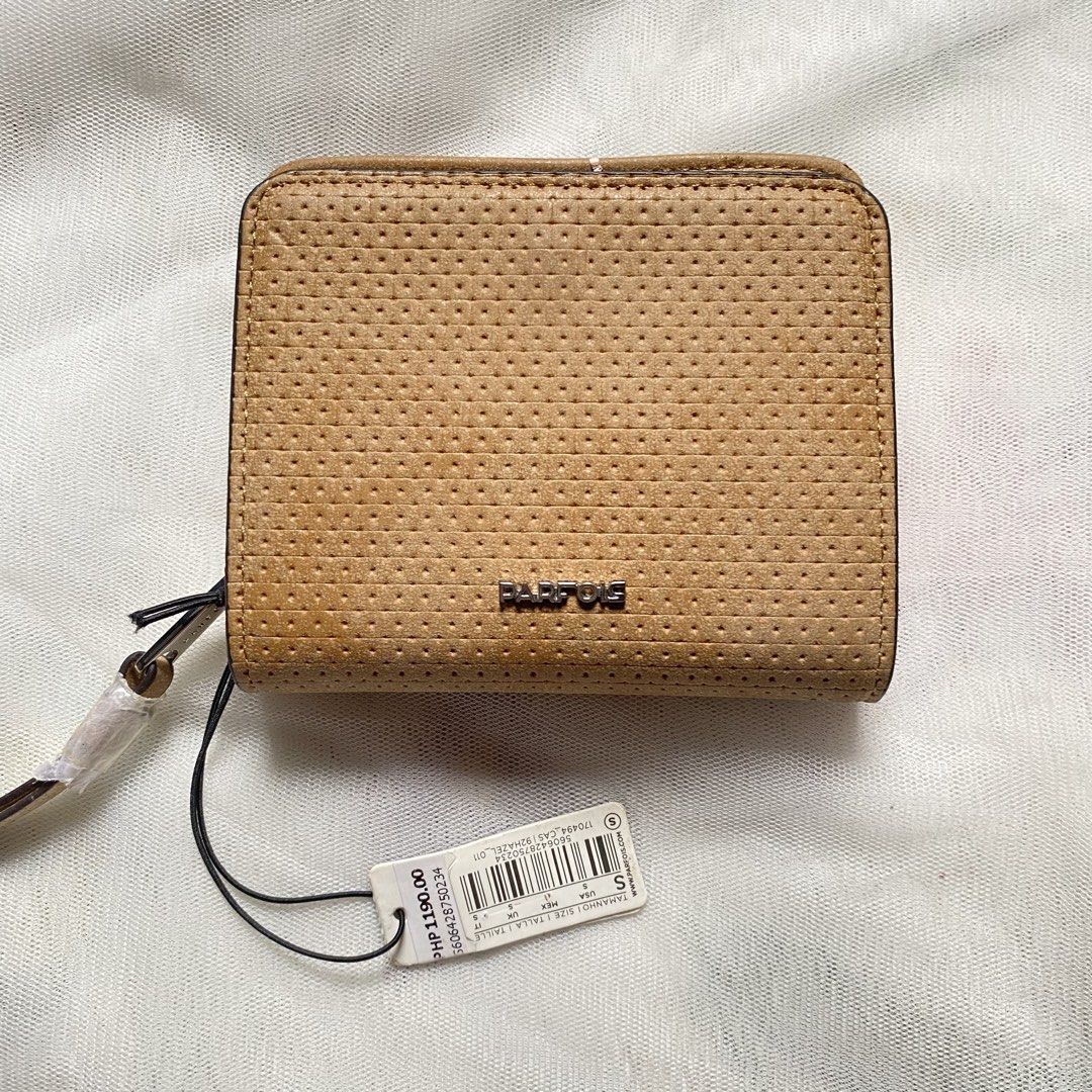 Parfois Perforated Zip Around Wallet (Category: Wallets & Card holders) located in Makati City. Submitted by imsuli (Listing ID 1438931965, Image 1). Description: ෆ Color: Tan ෆ Multiple card slots ෆ Clear ID window ෆ Coin compartment ෆ With original price tag.