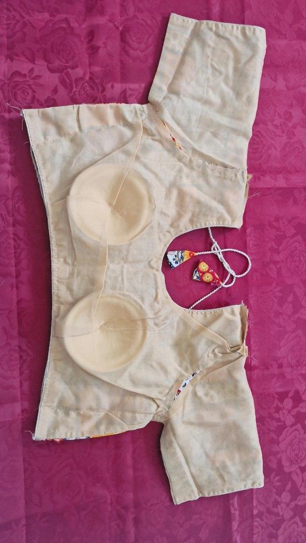 Patchwork Blouse with String Tie (Category: Blouses) located in Singapore. Submitted by angrybird12 (Listing ID 1438927393, Image 3). Description: - Multi coloured patchwork print cotton blouse - Adjustable string tie at back - Soft inner lining - Padded cups - Adds a pop of color to your outfit.