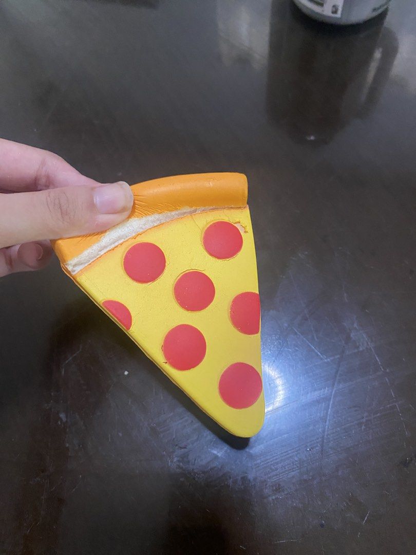 Pizza Slice and Heart Squishy Toys (Category: Kids Toys) located in Marikina City. Submitted by sansa16 (Listing ID 1438895147, Image 2). Description: - Bundle - Pizza Slice Squishy: Yellow base, red pepperoni, orange crust. - Heart Squishy: Yellow, heart eyes, smiling face. - Both are soft and squishy. - Perfect for stress relief or collecting!.