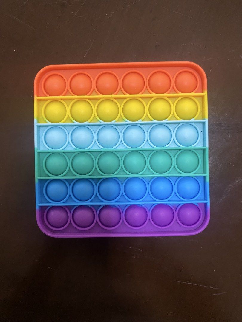 Pop It Fidget Toys - Rainbow Dinosaur and Square (Category: Kids Toys) located in Marikina City. Submitted by sansa16 (Listing ID 1438894403, Image 3). Description: - 200 Each - 350 if set.