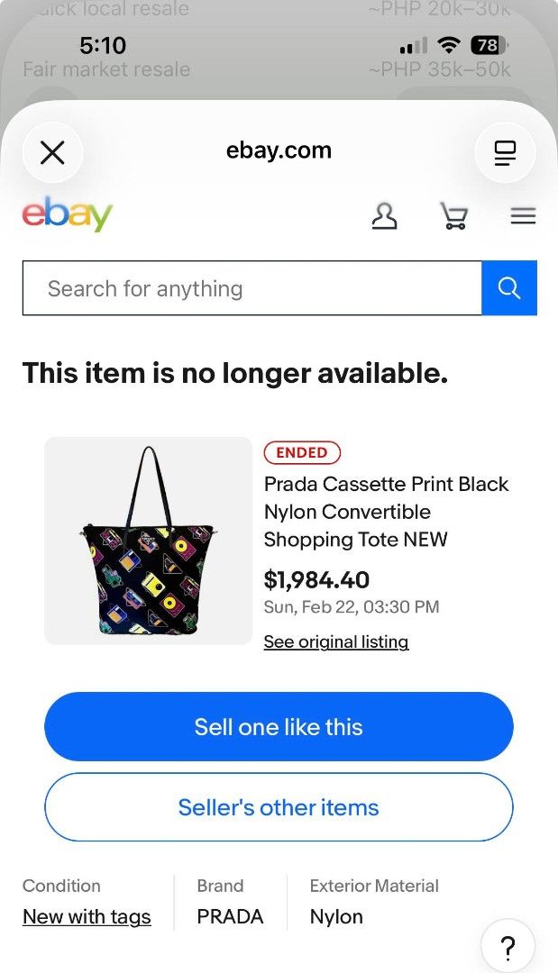 Prada Cassette Print Black Nylon Tote Bag (Category: Luxury Bags & Wallets) located in Mandaluyong City. Submitted by kimberlygo (Listing ID 1438897264, Image 3). Description: - Prada tote bag with cassette print design - Black leather handles - Secure zipper closure - Includes authenticity cards - Durable nylon exterior - Features retro cassette tapes and turntable images.