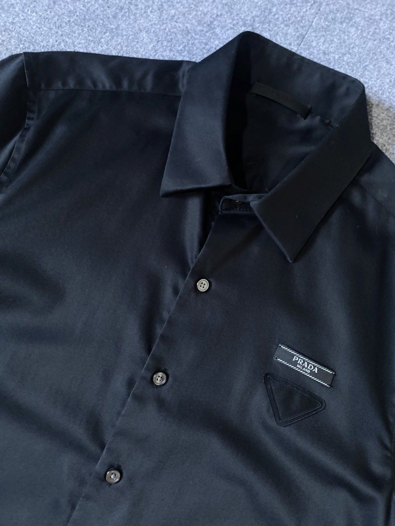 PRADA TRIPLE BLACK POLO SHIRT (Category: Tshirts & Polo Shirts ) located in Antipolo. Submitted by treasurethings02 (Listing ID 1439064974, Image 2). Description: Dimensions 21/28 Large fit Nylon Material Excellent to as new issue none .
