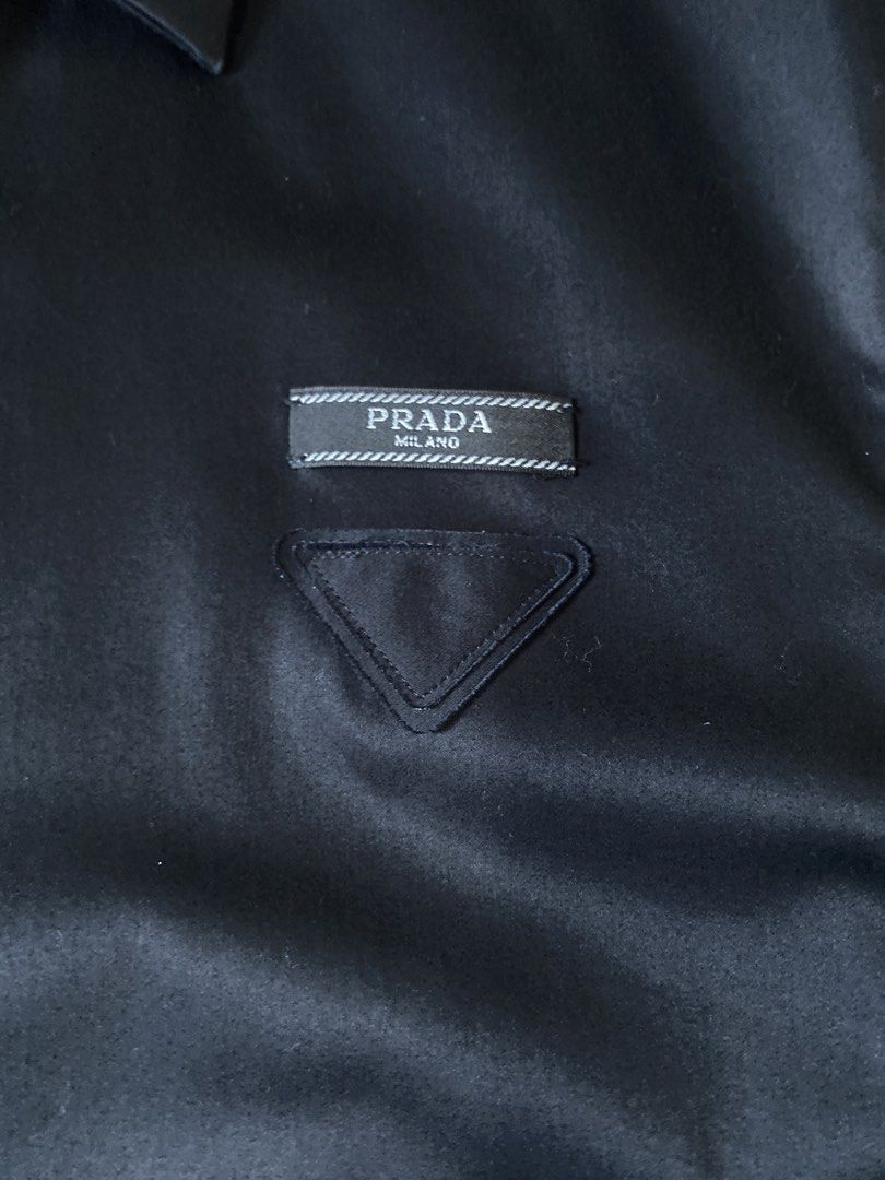 PRADA TRIPLE BLACK POLO SHIRT (Category: Tshirts & Polo Shirts ) located in Antipolo. Submitted by treasurethings02 (Listing ID 1439064974, Image 3). Description: Dimensions 21/28 Large fit Nylon Material Excellent to as new issue none .