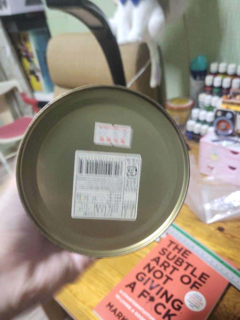 Return to the Sea Tin Can (Category: Storage Boxes & Baskets) located in Caloocan City. Submitted by lynette1977 (Listing ID 1439031631, Image 3). Description: - Decorative tin can with a unique design. - Features a seal and snowflake details. - Lid includes the phrase "Return to the Sea of Our Dreams". - Cylindrical shape with a blue and white color scheme. - Empty inside. - Bottom of the can has labels. - Perfect for collectors or as a decorati