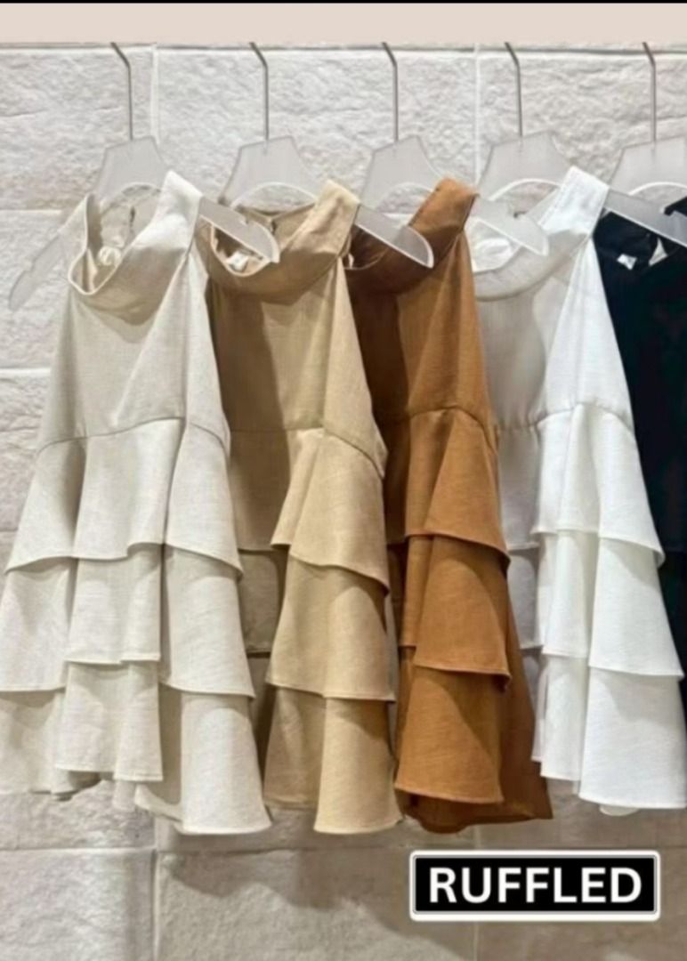 Ruffled Halter Top TIRA STUDIO (Category: Sets or Coordinates) located in Manila. Submitted by PureWonder_Shop (Listing ID 1439047180, Image 2). Description: 💛 TIRA STUDIO Color: Latte Fabric: Premium Linen (hindi makate/itchy fabric, this is premium) Fits up to 36 bust Latte color is between Cream & Brown at the 2nd photo ✨ - Halter top with layered ruffles - High neckline, sleeveless design - Ideal for casual & stylish outfit 🧁 FREE SF WITHIN