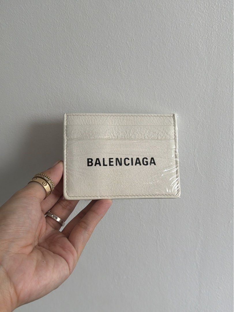 RUSH Balenciaga off white card holder (Category: Luxury Bags & Wallets) located in General Trias. Submitted by by-ea (Listing ID 1438400575, Image 2). Description: Guaranteed auth Rare find, preloved not fresh from store Please manage expectation it’s off white not true white No other inclusions Make an offer 🩶.