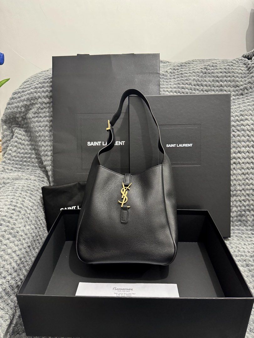 YSL Saint Laurent Hobo Bag (Category: Luxury Bags & Wallets) located in Batangas. Submitted by charmmartinez (Listing ID 1438947994, Image 2). Description: YSL LE 5 À 7 Small - Authentic Saint Laurent Hobo bag - Color: Black - Features gold-tone YSL logo and hardware - Includes original box, dust bag, and tags - Interior zippered pocket - Shoulder strap - Material: Leather - Brandnew, complete with copy of receipt .