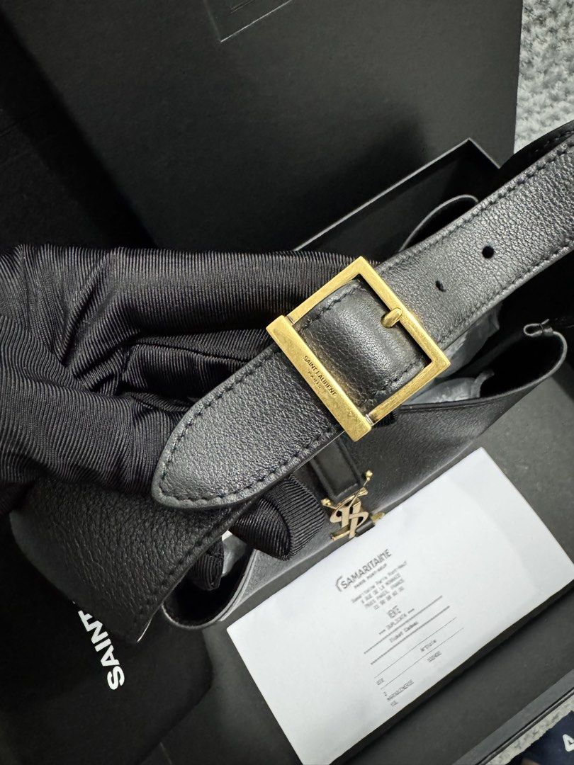 YSL Saint Laurent Hobo Bag (Category: Luxury Bags & Wallets) located in Batangas. Submitted by charmmartinez (Listing ID 1438947994, Image 3). Description: YSL LE 5 À 7 Small - Authentic Saint Laurent Hobo bag - Color: Black - Features gold-tone YSL logo and hardware - Includes original box, dust bag, and tags - Interior zippered pocket - Shoulder strap - Material: Leather - Brandnew, complete with copy of receipt .