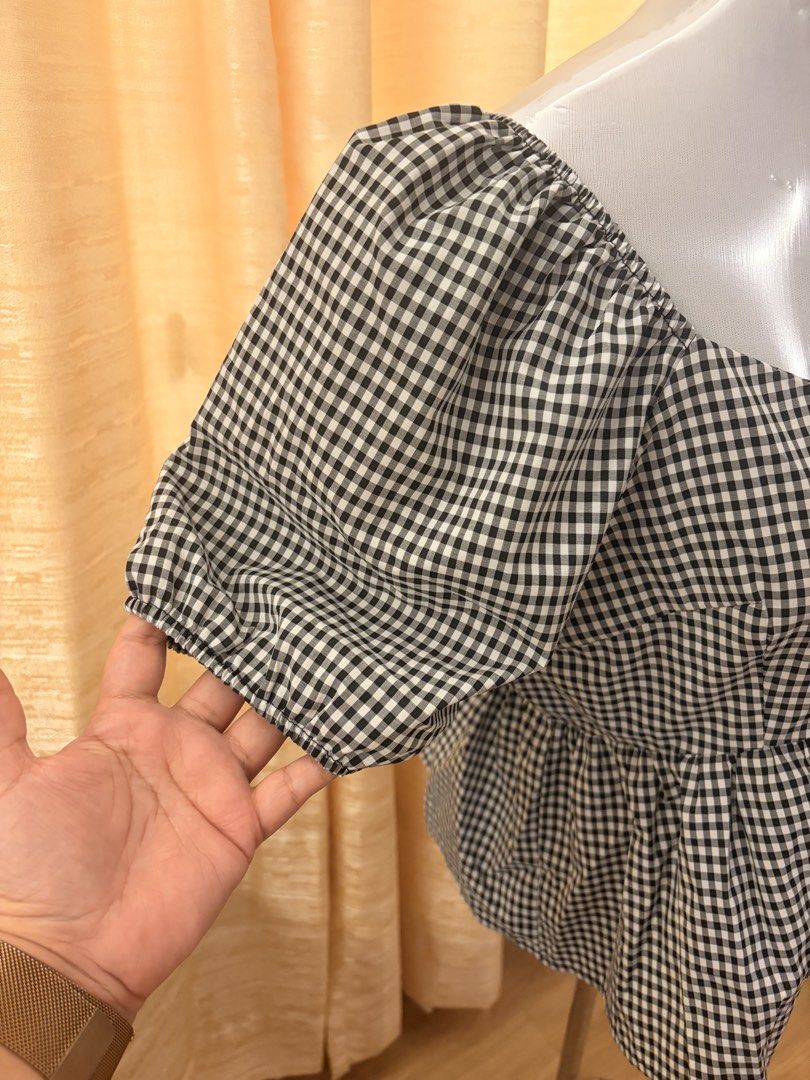 SHEIN Gingham Checkered Top with Puff Sleeves peplum (Category: Blouses) located in Quezon City. Submitted by ninas_preloved (Listing ID 1438948170, Image 3). Description: - Gingham checkered top - Sweetheart neckline - Puff sleeves - Peplum design - Lightweight fabric - Versatile for casual or dressy looks - Pairs well with jeans, skirts, or shorts.