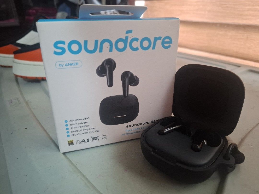 Soundcore R60i NG Earbuds (Category: Earphones) located in Manila. Submitted by oddtiger.2d0471 (Listing ID 1438900208, Image 1). Description: - Soundcore R60i NG earbuds - Includes charging case and accessories - Color: Black - Features Soundcore logo and model name on the box - Charging case included.
