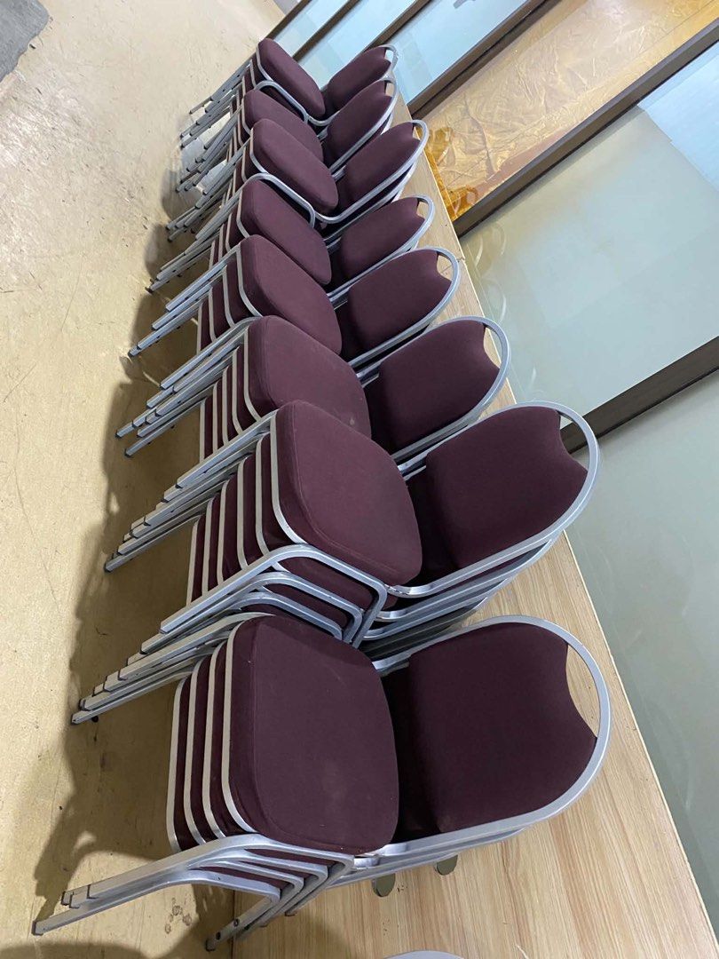 Stackable Banquet Chairs 40pcs Available (Category: Chairs) located in Manila. Submitted by marquezpa52205 (Listing ID 1439017253, Image 2). Description: - Durable and stackable banquet chairs - Burgundy fabric seat and backrest - Silver metal frame - Designed for easy storage and space-saving - Suitable for indoor and outdoor use - Comfortable seating for guests.