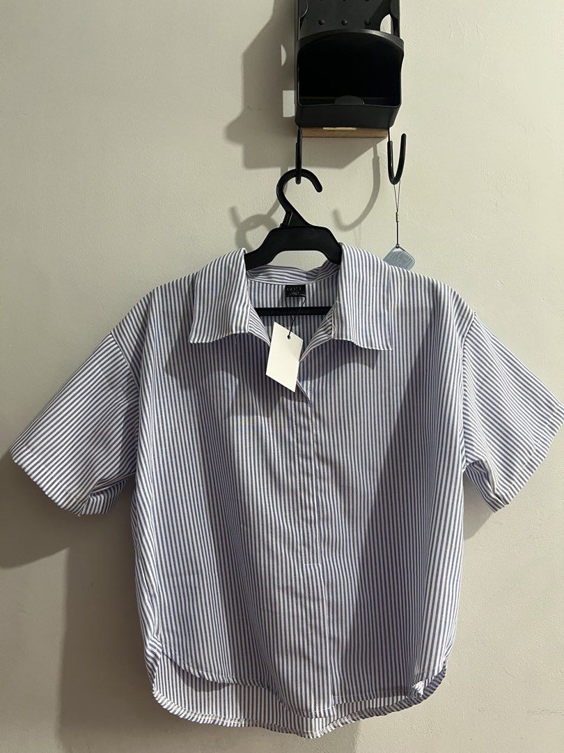 Striped Short Sleeve Shirt (Category: Shirts) located in Manila. Submitted by chiiiiing2 (Listing ID 1438911466, Image 1). Description: - Brand new shirt - Classic striped pattern - Collared neckline - Button-down design - Original tag attached - Small to Large.