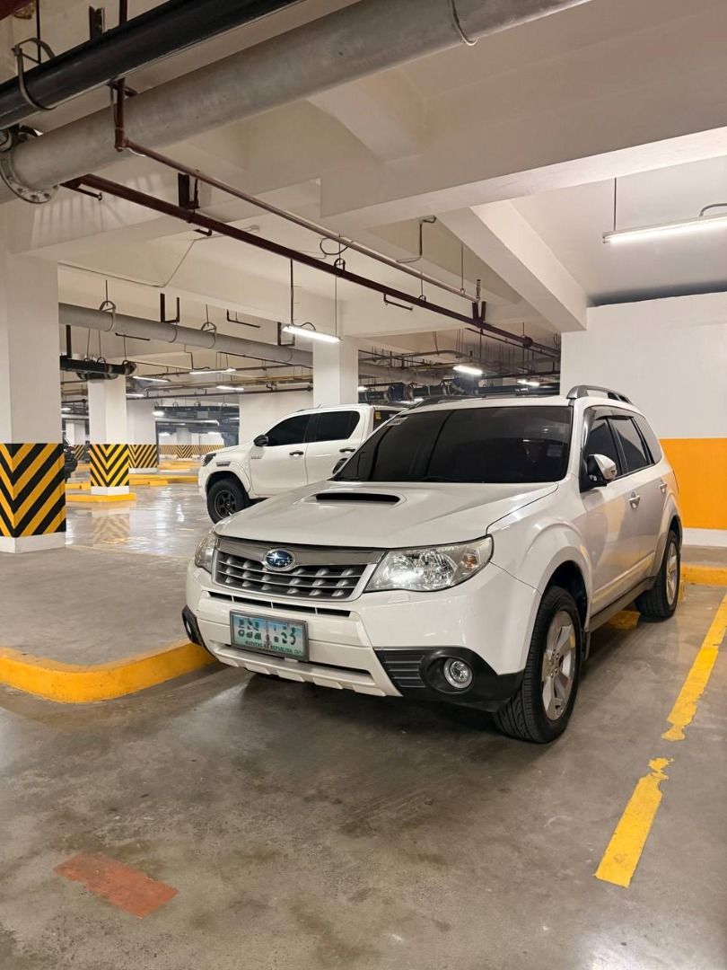 Subaru Forester 2.5 XT (A) (Category: Used Cars) located in Quezon City. Submitted by omniversatility (Listing ID 1439030630, Image 2). Description: 2012 Subaru Forester XT AWD (Top of the Line) First Owned, Personal Family Car 2.5L Turbo Gas Original Odo 90t+ kms All Orig Paint (Pearl White) Fresh Interior Automatic Transmission Leather Interior Digital Climate Control Cruise Control Sunroof (Working) Plate Ending “3” Well Maintained Zero Histor