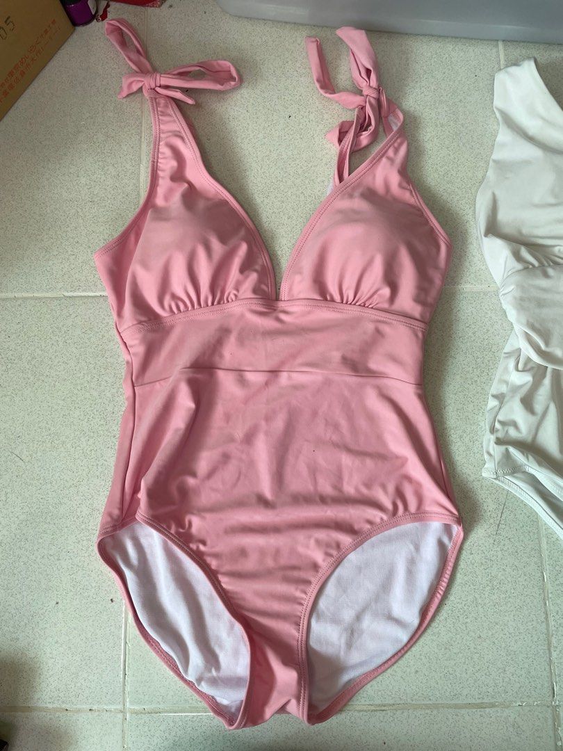 Swimsuit set TAKE ALL (Category: Bikinis & Swimsuits) located in Dasmarinas. Submitted by glamsofmerci (Listing ID 1438931506, Image 2). Description: Please manage expectations, this is a preloved item Pink & white swimsuit - H&M Red - unknown brand MOP: Gcash, Maya, BPI MOD: Lalamove, J&T SF to be shouldered by buyer 📍Dasmariñas, Cavite.