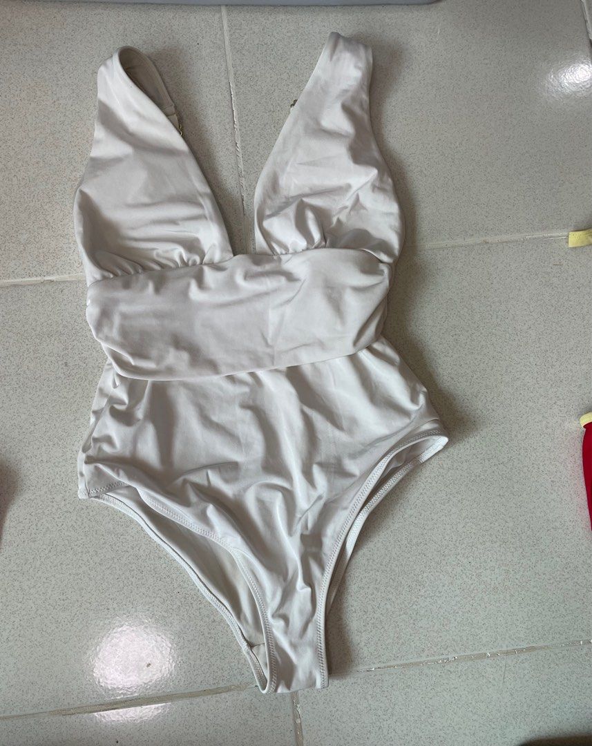 Swimsuit set TAKE ALL (Category: Bikinis & Swimsuits) located in Dasmarinas. Submitted by glamsofmerci (Listing ID 1438931506, Image 3). Description: Please manage expectations, this is a preloved item Pink & white swimsuit - H&M Red - unknown brand MOP: Gcash, Maya, BPI MOD: Lalamove, J&T SF to be shouldered by buyer 📍Dasmariñas, Cavite.